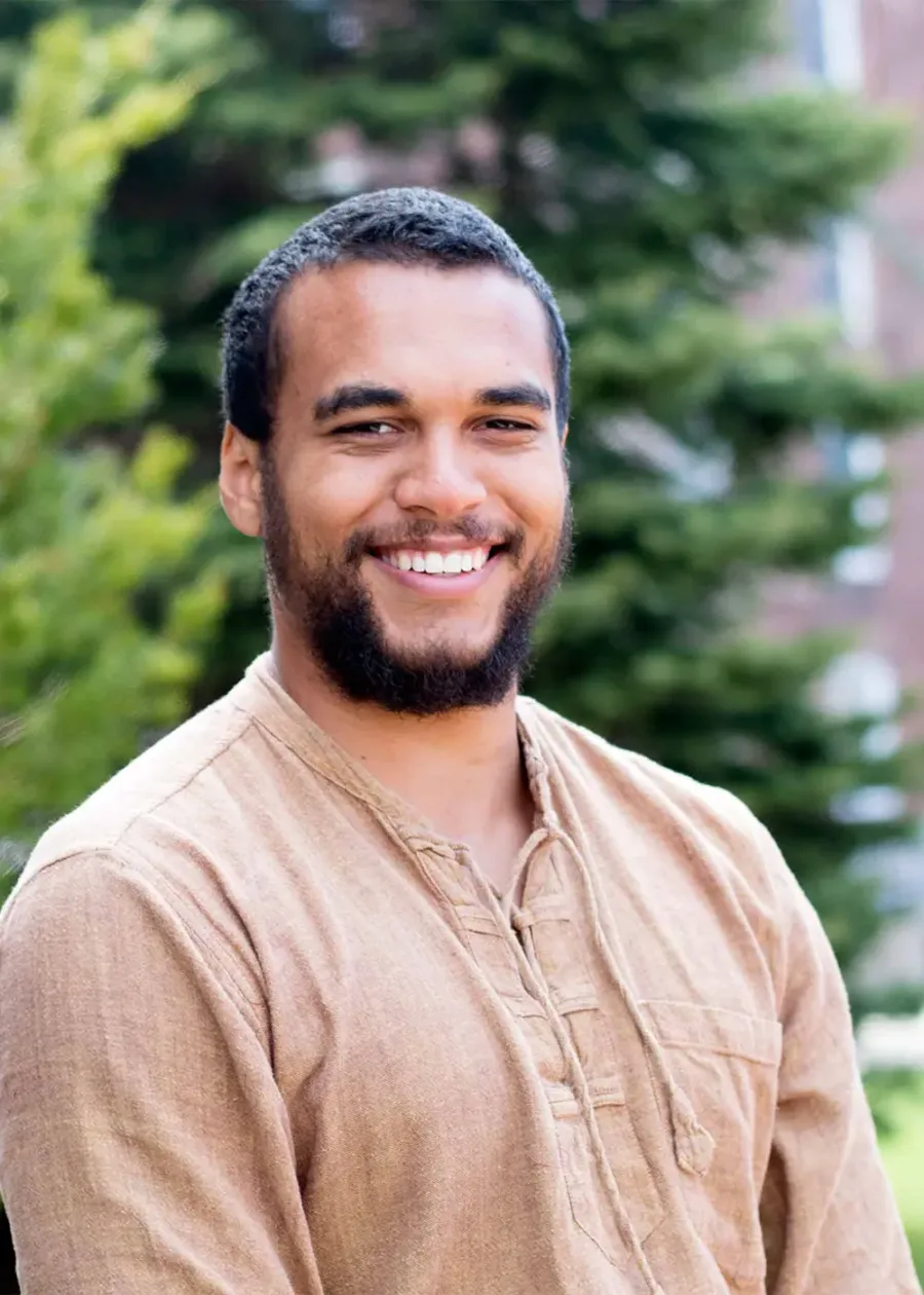Headshot of Kai Thomas