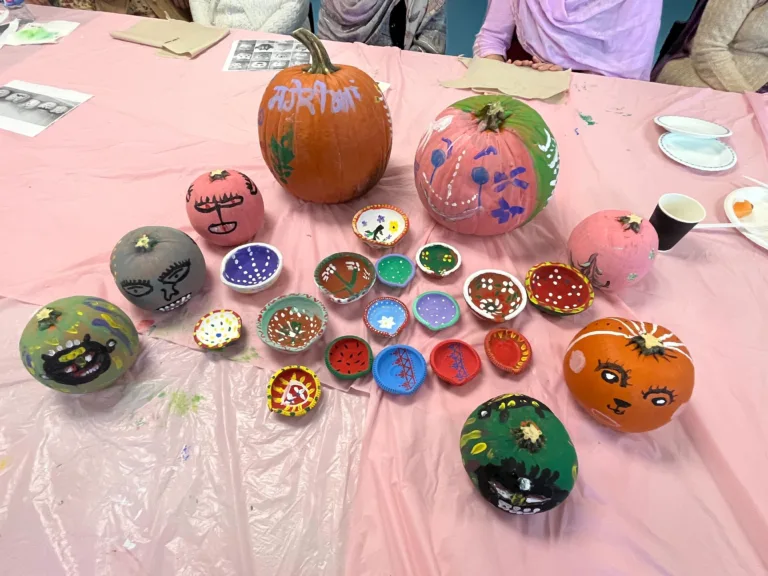 Decorated pumpkins and clay trays